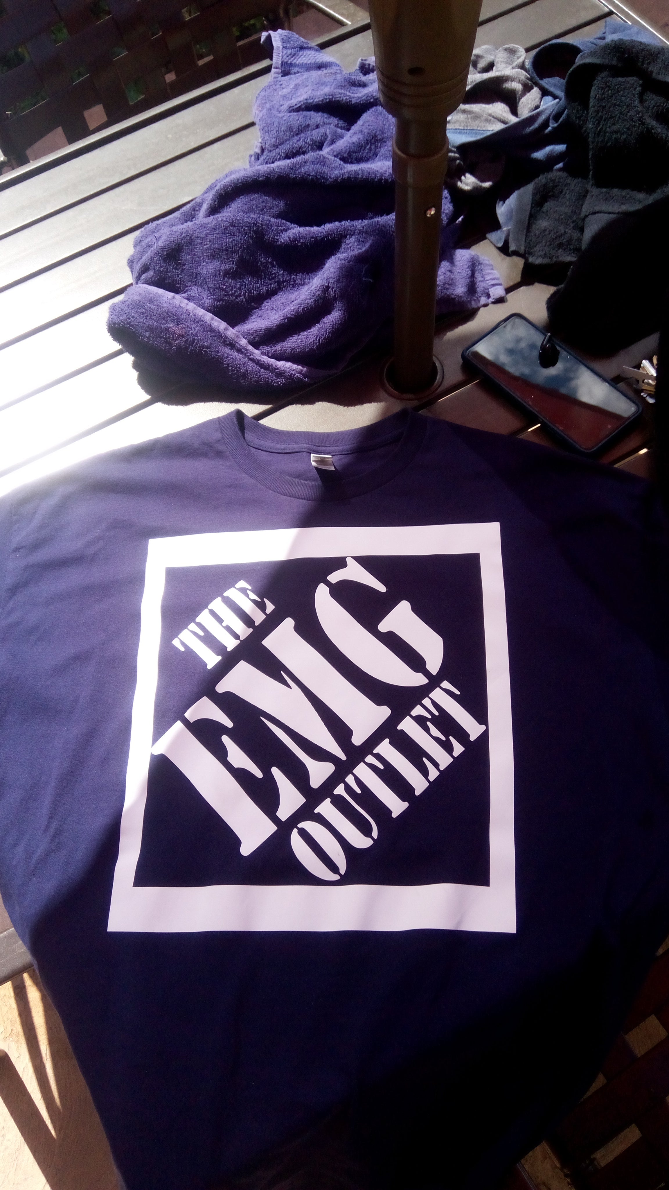 THE EMG OUTLET flagship T-Shirt